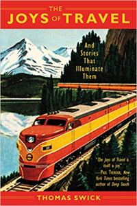 The Joys of Travel book cover feturing a retro image of a train